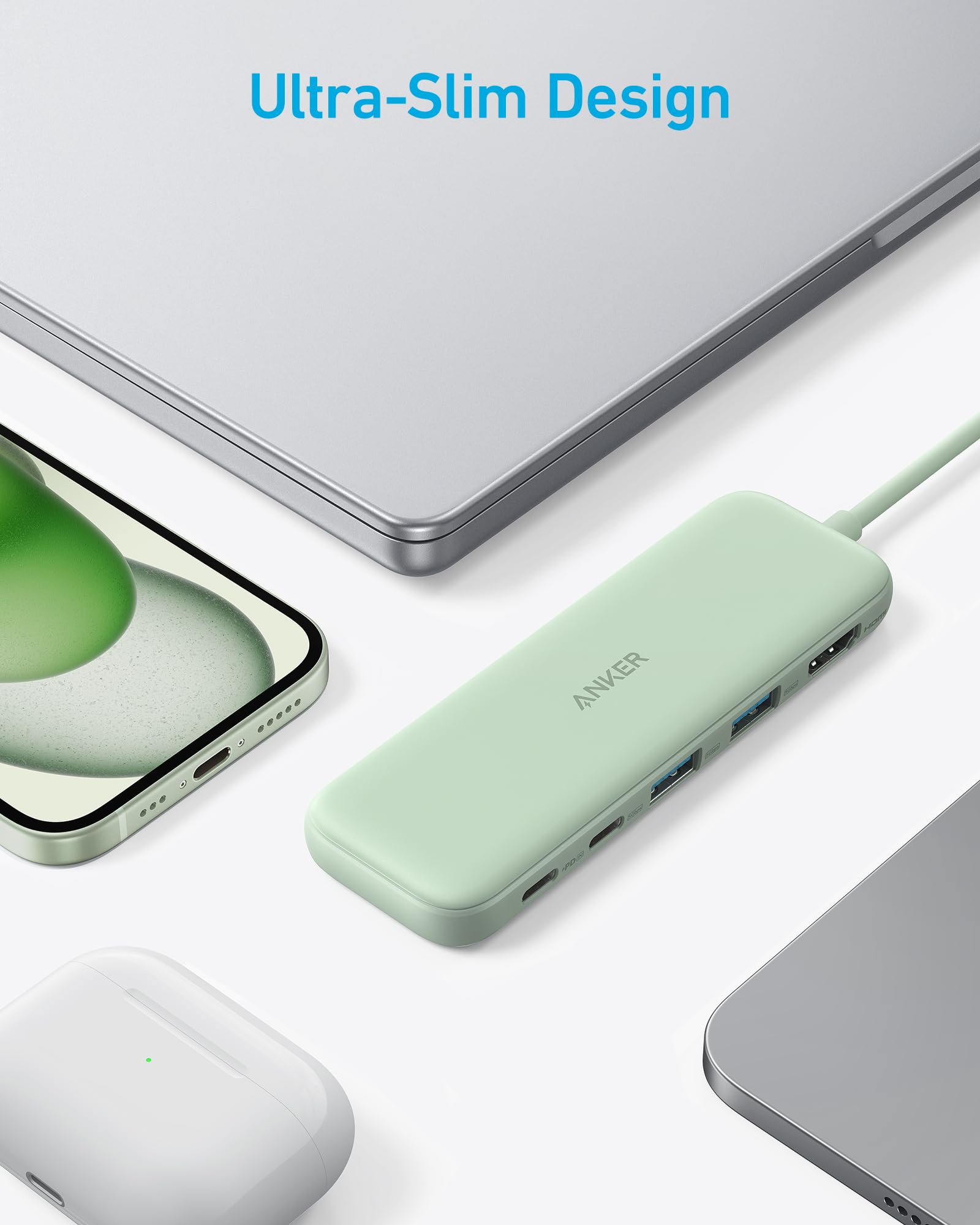 Green USB hub with smartphone, laptop, and mouse on a white background